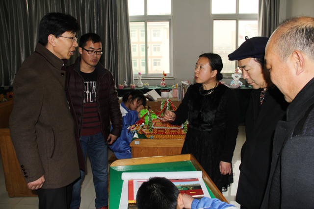 日照市教育局有關(guān)領(lǐng)導(dǎo)到我?？疾鞂W(xué)校建設(shè)及教育教學(xué)情況